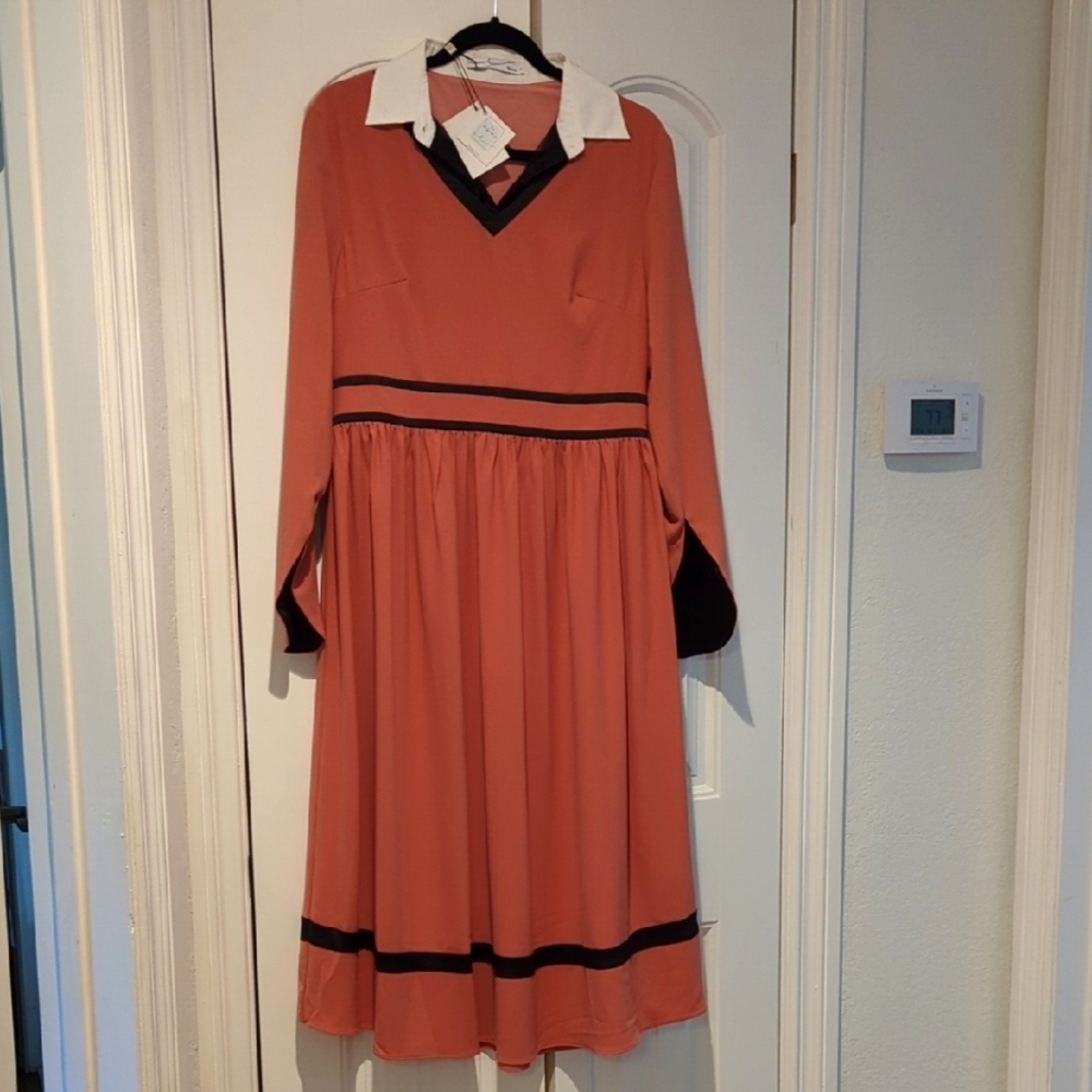 Elegant Peach Dress with Black Accents